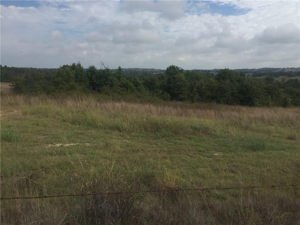 0 Starr Mann Road St. Jo, TX 76265 - Photo 6 of 12 a view of a lake with houses in the back