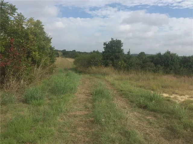 a view of a lake with mountains in the background