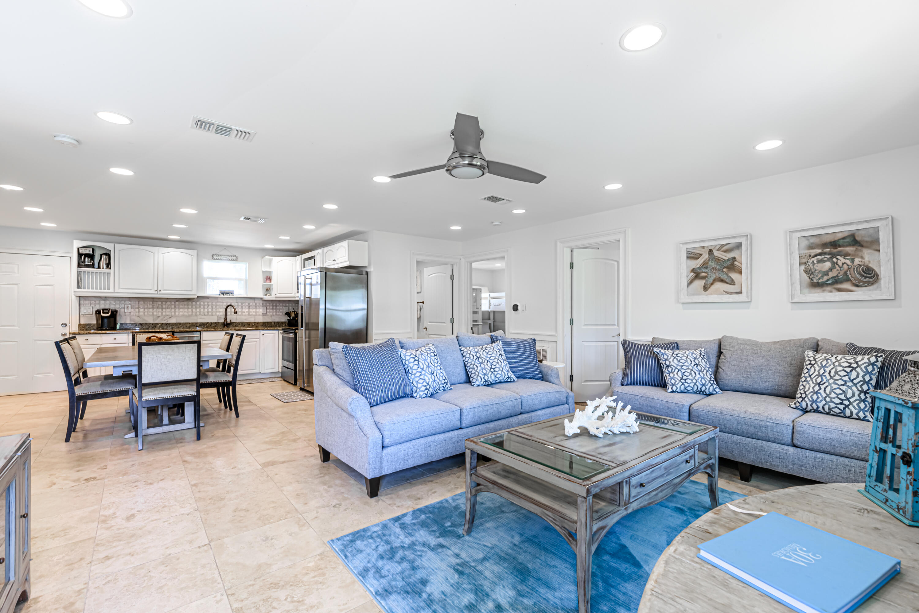 281 Elm Street Santa Rosa Beach, FL 32459 - Photo 11 of 37 a living room with furniture kitchen view and a table