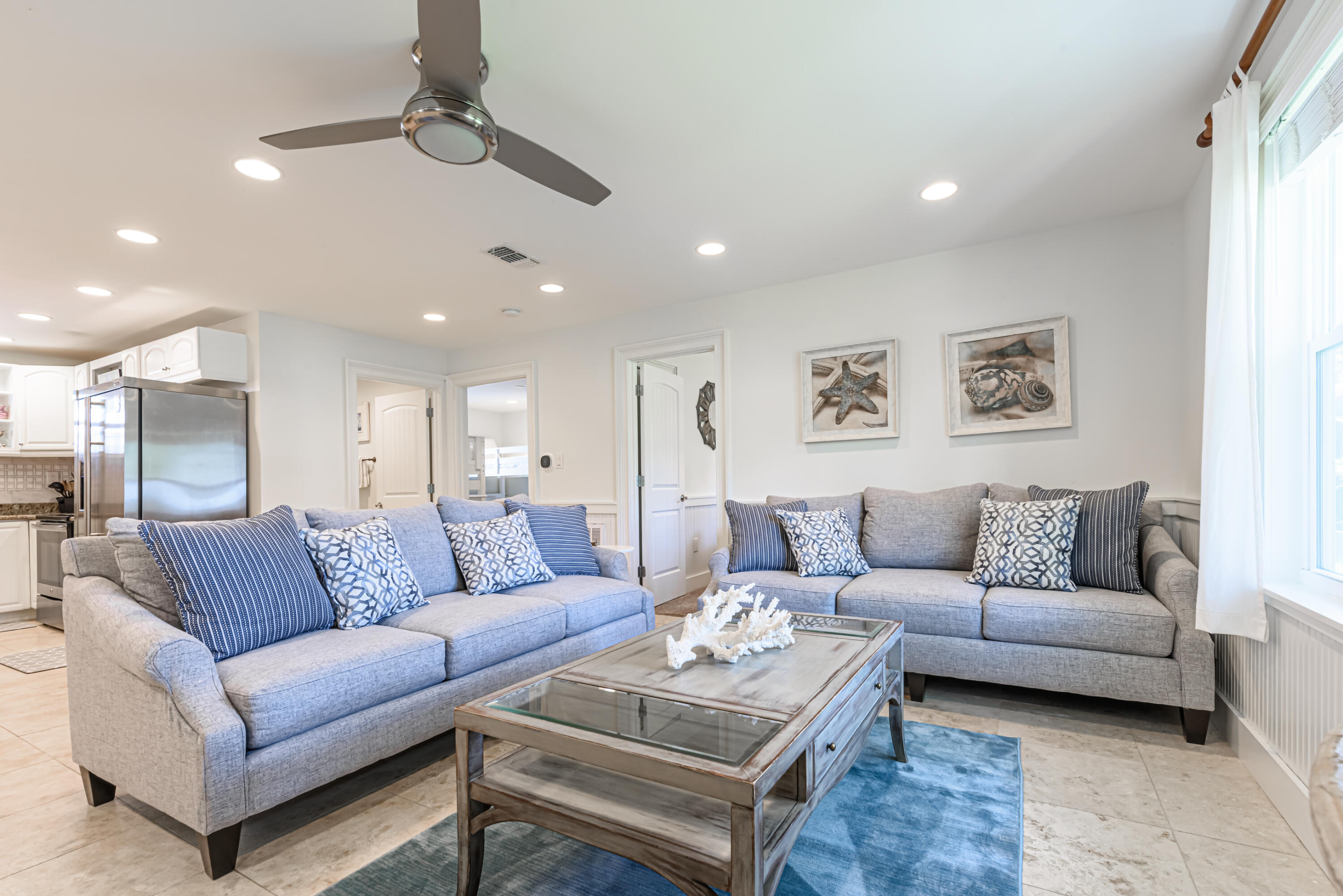 281 Elm Street Santa Rosa Beach, FL 32459 - Photo 13 of 37 a living room with furniture and a ceiling fan