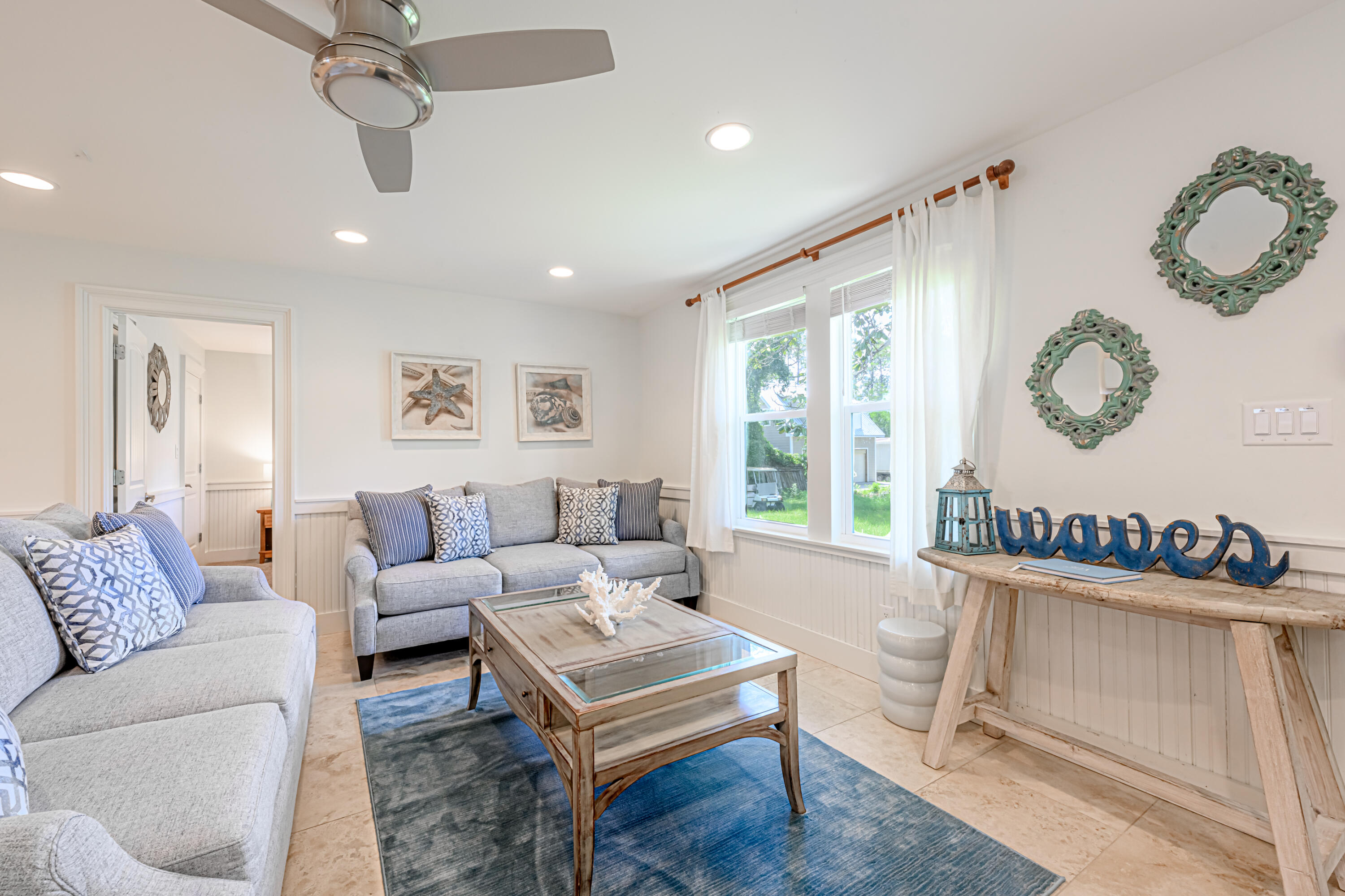 281 Elm Street Santa Rosa Beach, FL 32459 - Photo 14 of 37 a living room with furniture and a large window