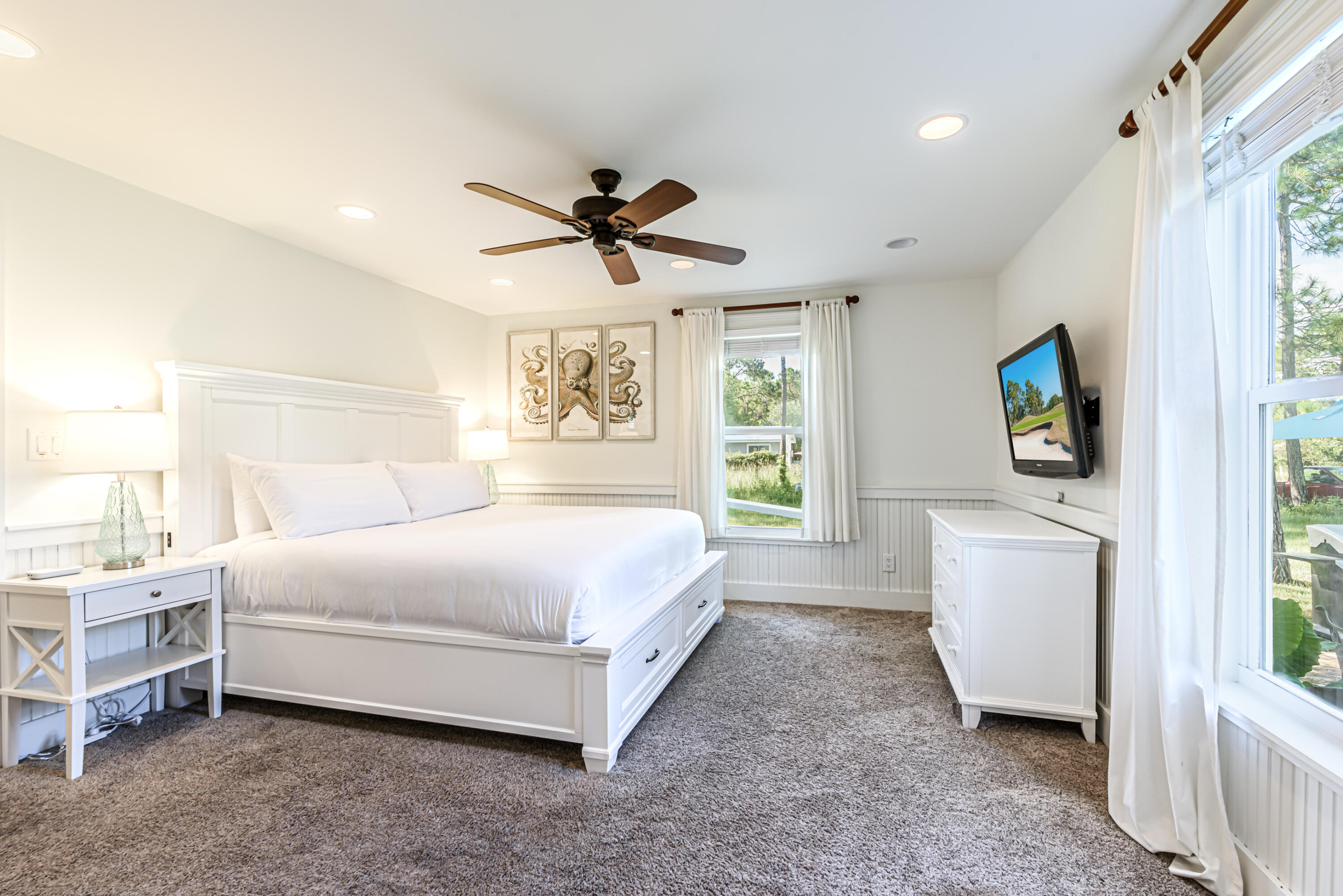 281 Elm Street Santa Rosa Beach, FL 32459 - Photo 16 of 37 a bedroom with a bed a couch and a window