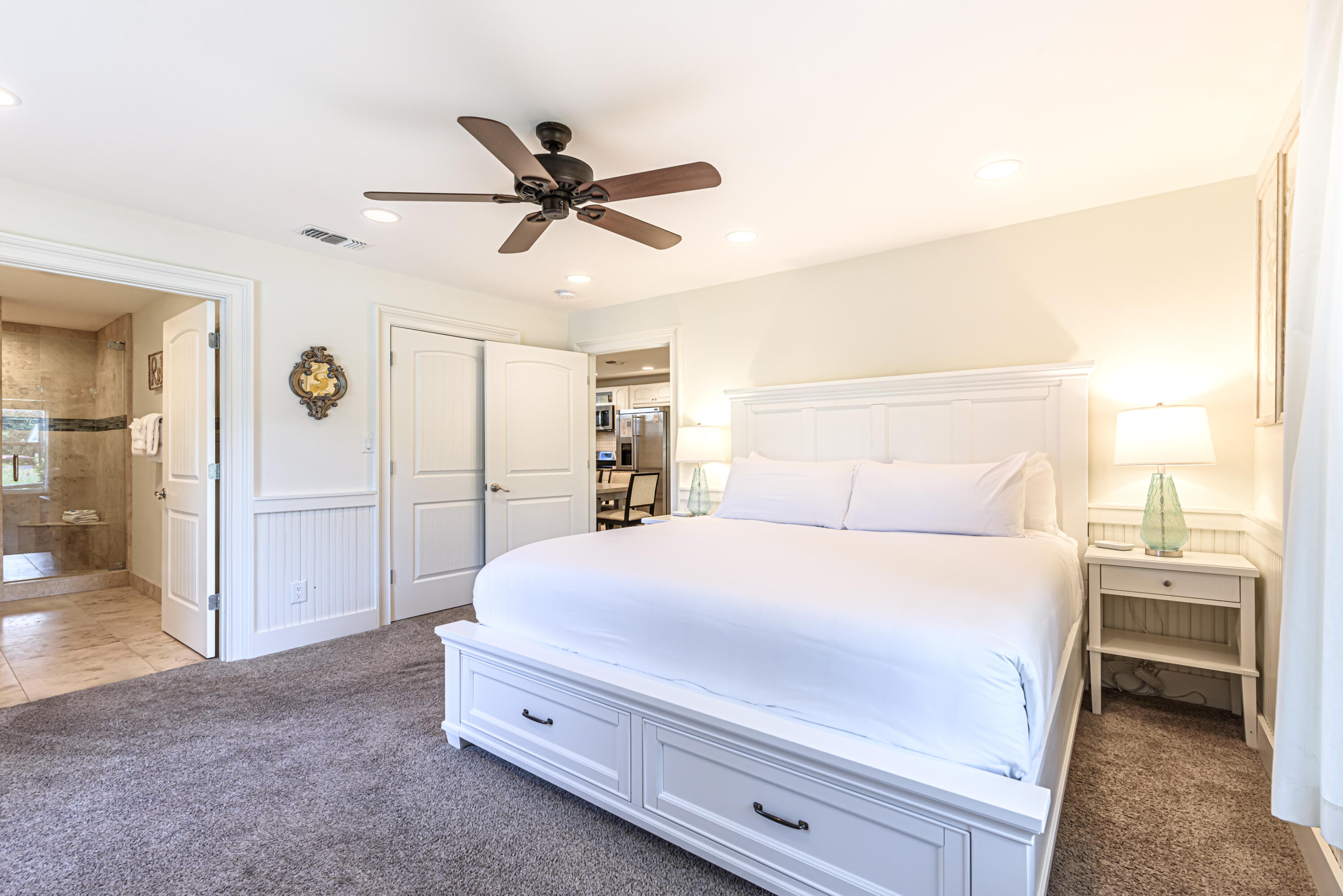 281 Elm Street Santa Rosa Beach, FL 32459 - Photo 17 of 37 a bedroom with a bed and a cabinets