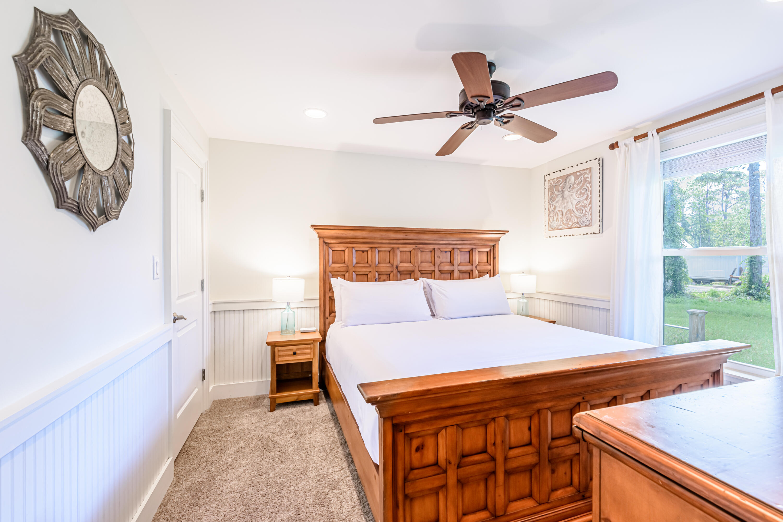 281 Elm Street Santa Rosa Beach, FL 32459 - Photo 20 of 37 a bedroom with a bed and a window