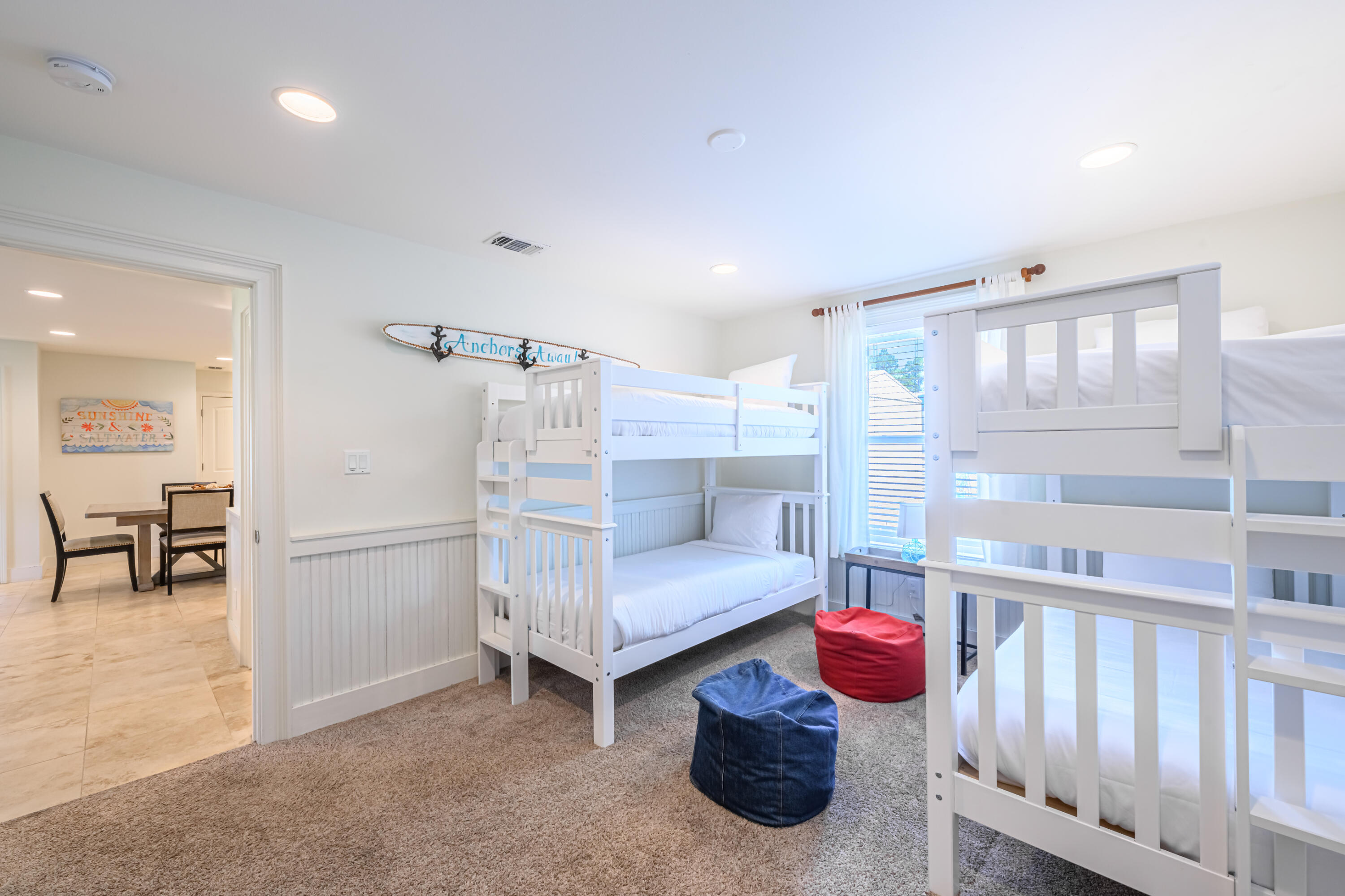 281 Elm Street Santa Rosa Beach, FL 32459 - Photo 22 of 37 a bedroom with furniture and a large window