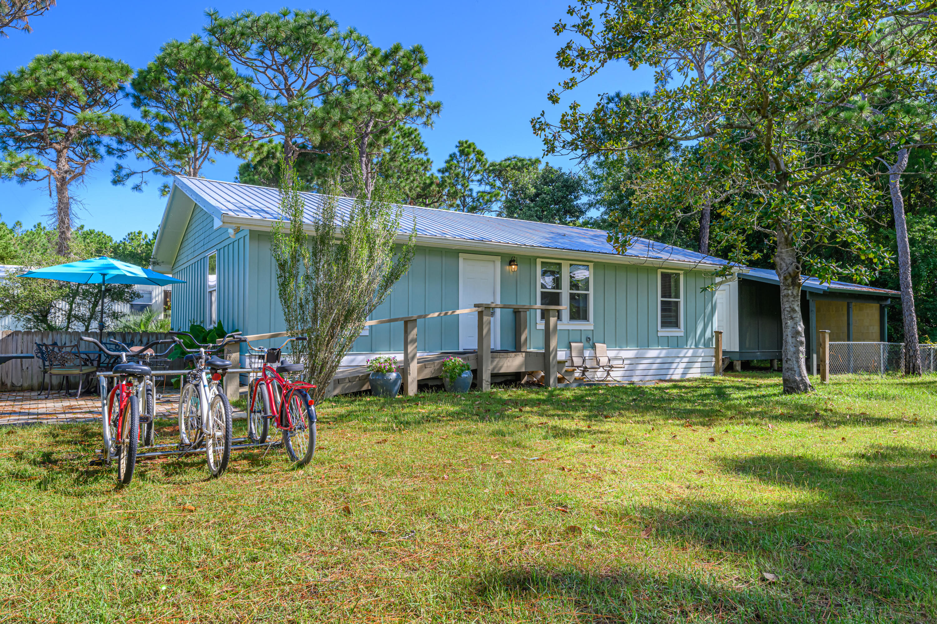 281 Elm Street Santa Rosa Beach, FL 32459 - Photo 29 of 37 a view of a house with a swimming pool