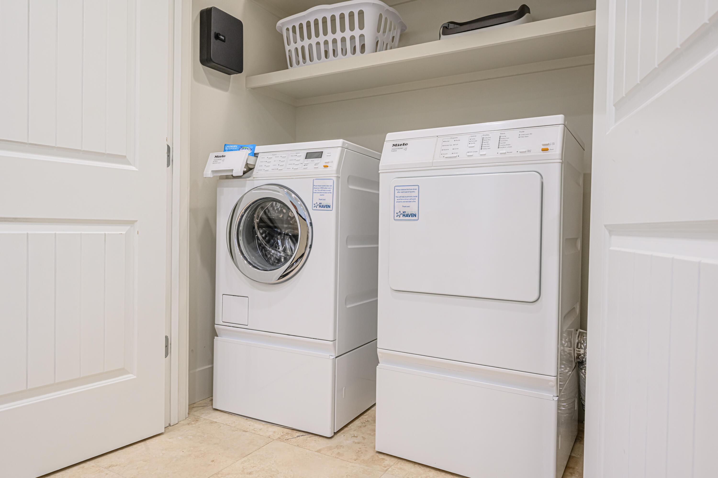 281 Elm Street Santa Rosa Beach, FL 32459 - Photo 10 of 37 a utility room with dryer and washer