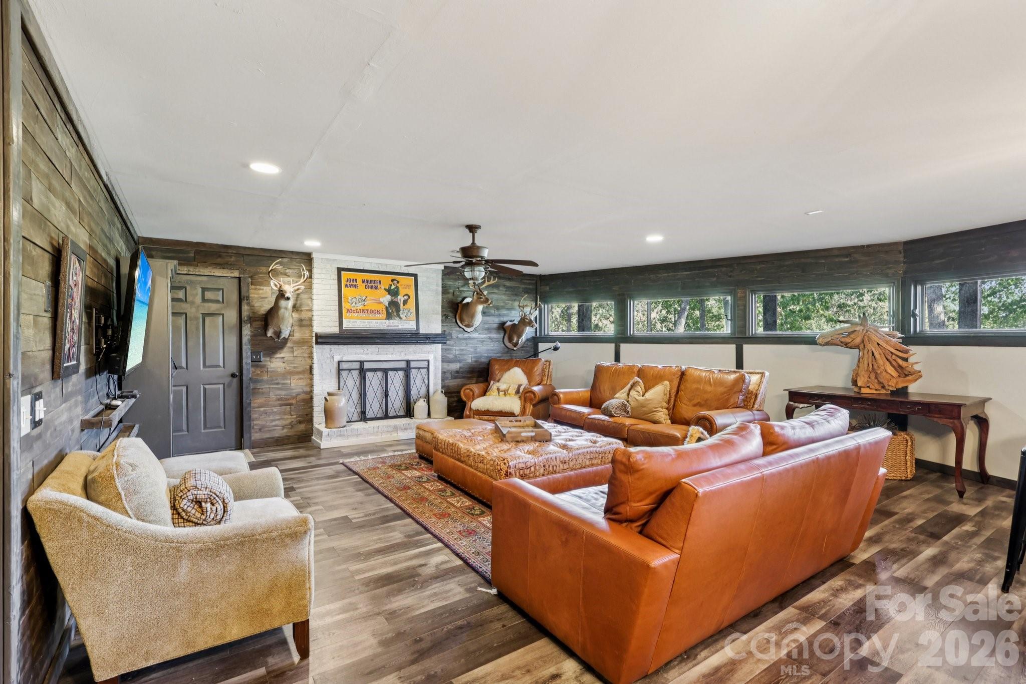 44333 Stony Gap Road Albemarle, NC 28001 - Photo 19 of 28 a living room with furniture and a flat screen tv