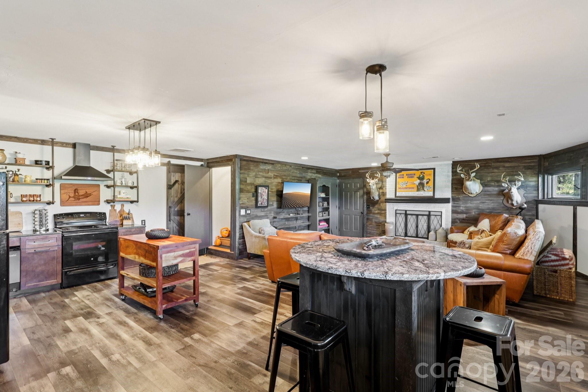 44333 Stony Gap Road Albemarle, NC 28001 - Photo 22 of 28 a living room with furniture a window and a table