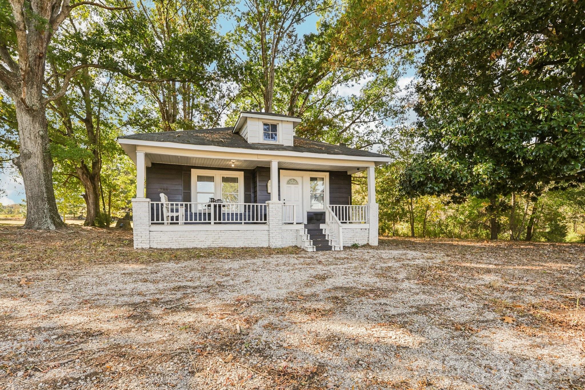 44333 Stony Gap Road Albemarle, NC 28001 - Photo 23 of 28 a view of a house with a outdoor space