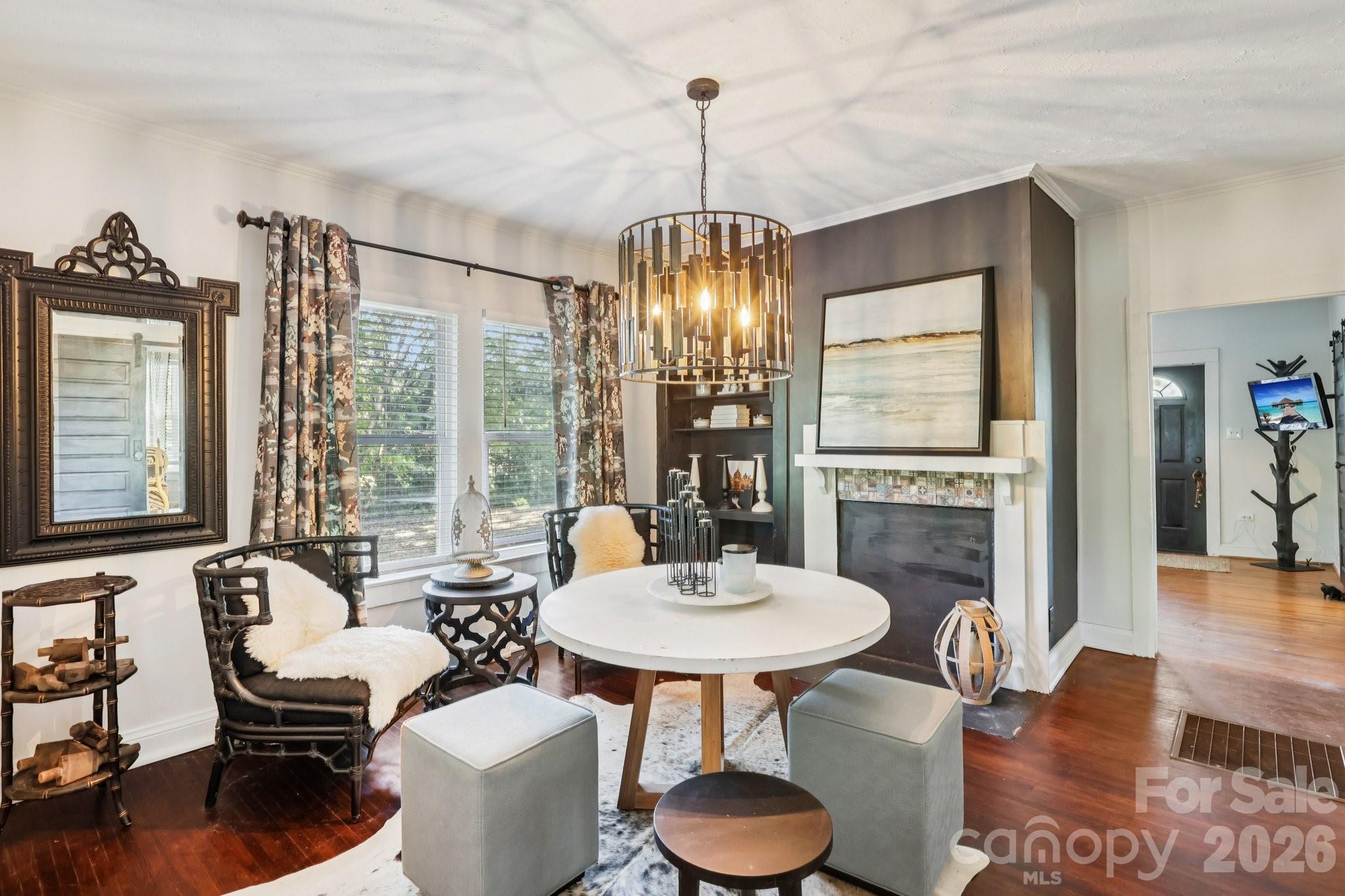 44333 Stony Gap Road Albemarle, NC 28001 - Photo 24 of 28 a living room with furniture and a fireplace
