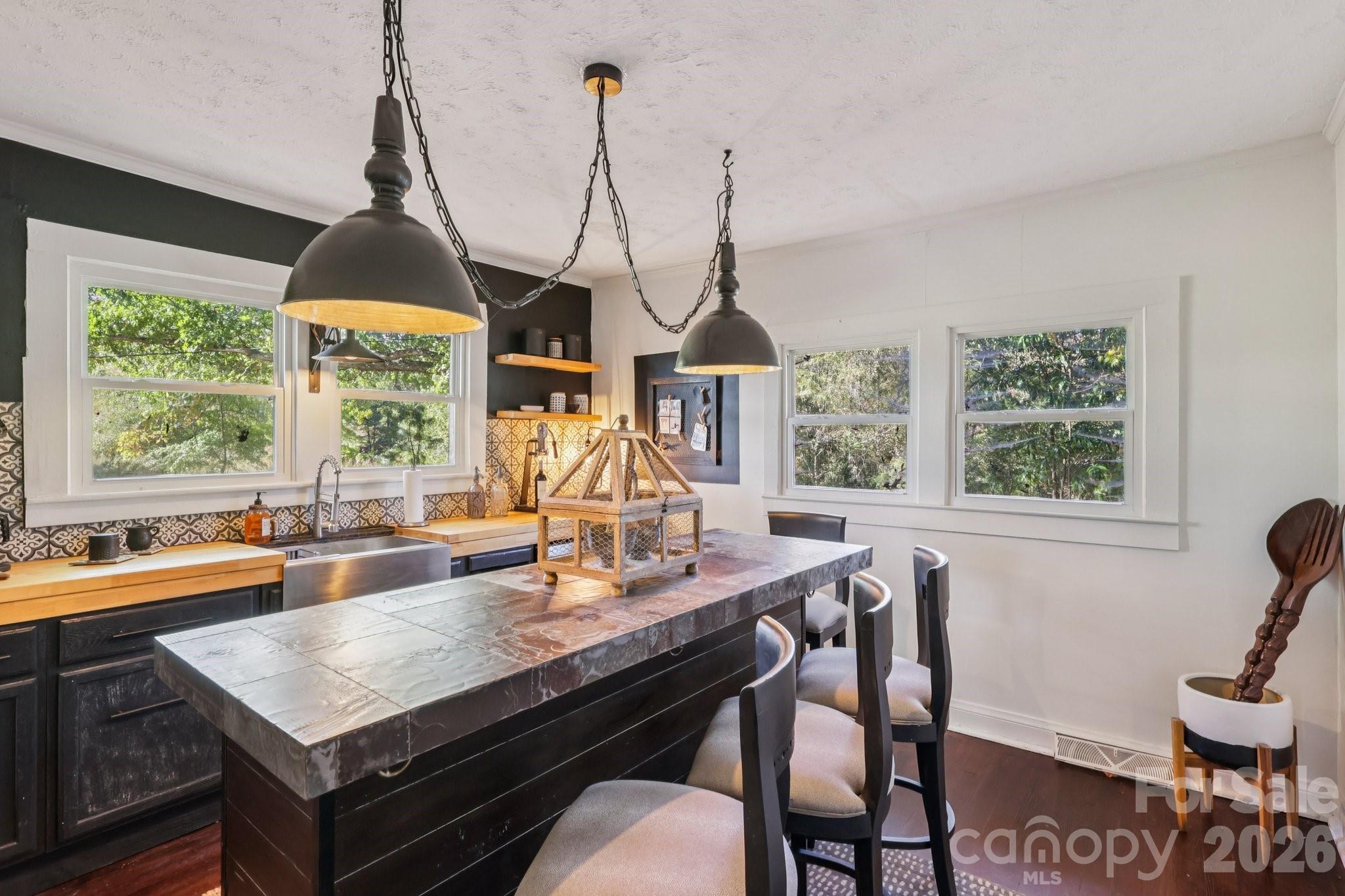 44333 Stony Gap Road Albemarle, NC 28001 - Photo 25 of 28 a dining room with a table and chairs