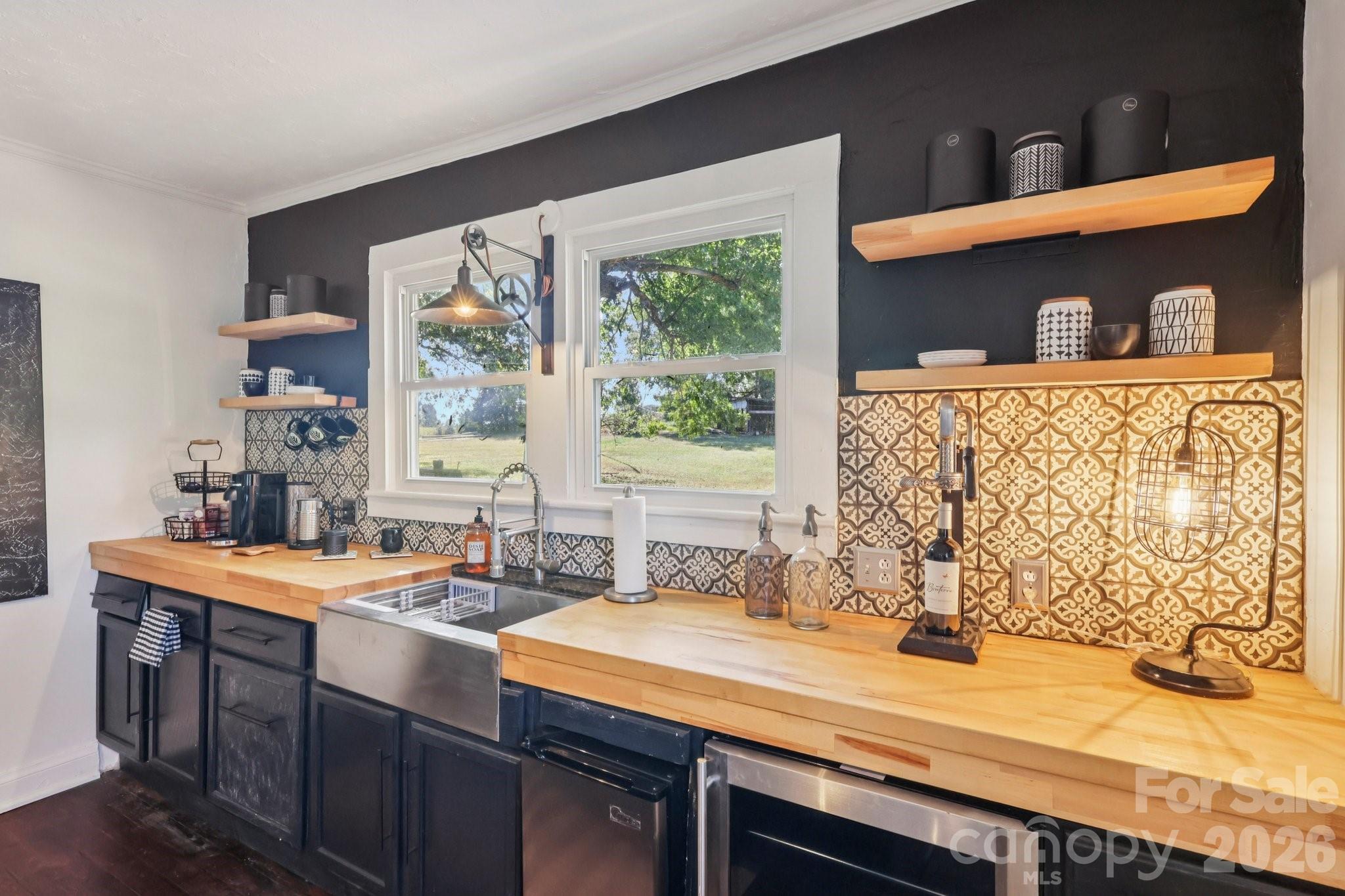 44333 Stony Gap Road Albemarle, NC 28001 - Photo 26 of 28 a kitchen with a sink and a window
