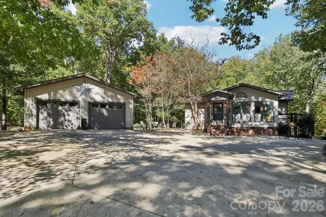 a view of a town with large trees