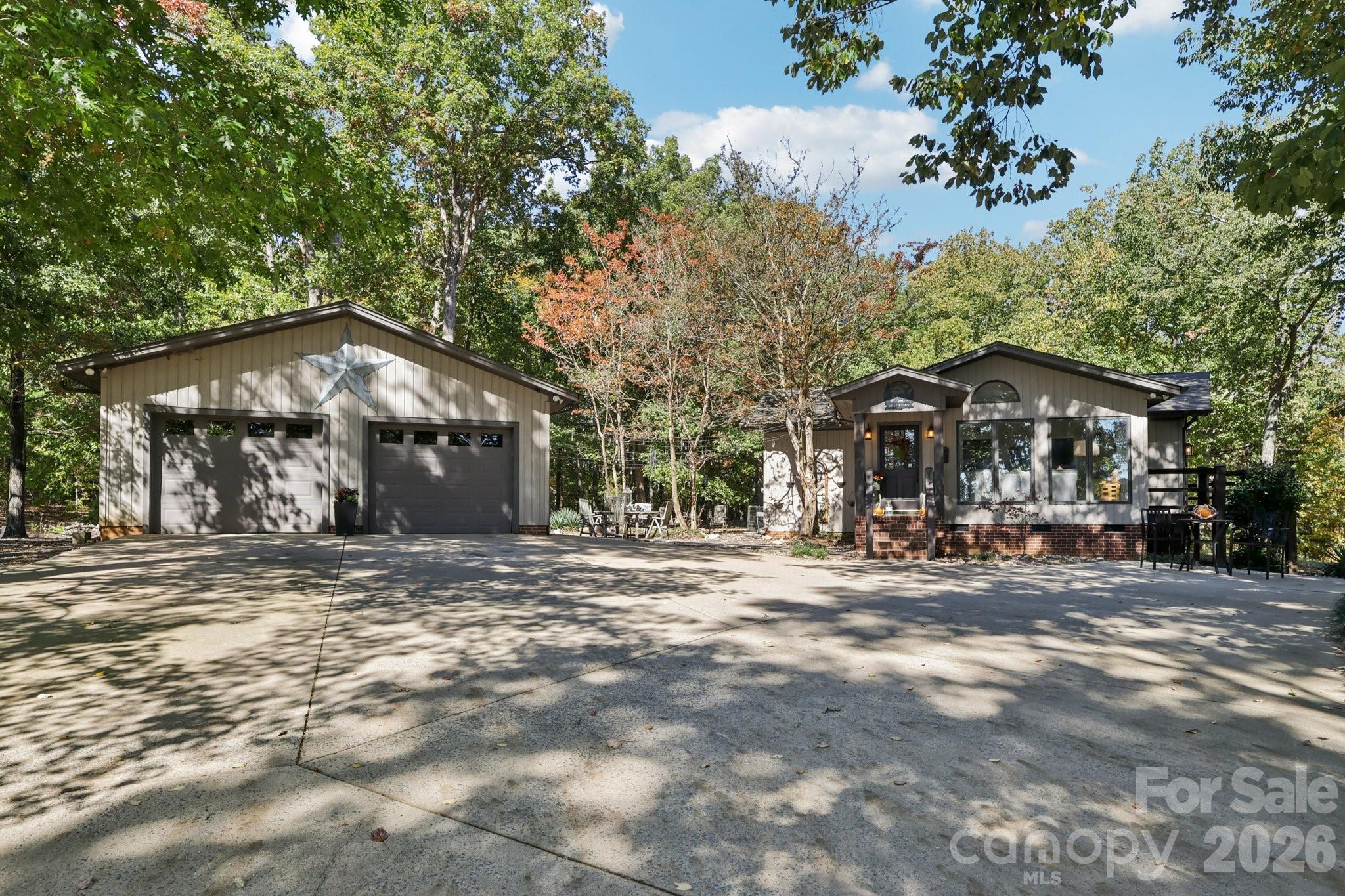 44333 Stony Gap Road Albemarle, NC 28001 - Photo 9 of 28 a view of a house with a yard and sitting area