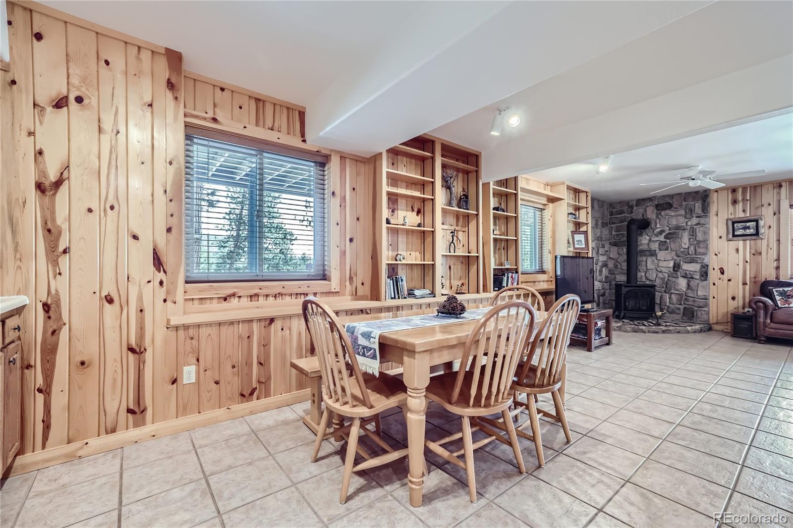 808 Conestoga Road Bailey, CO 80421 - Photo 28 of 50 a view of a dining room with furniture