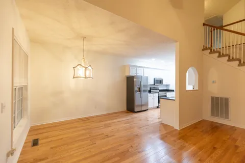 a view of a kitchen with a sink