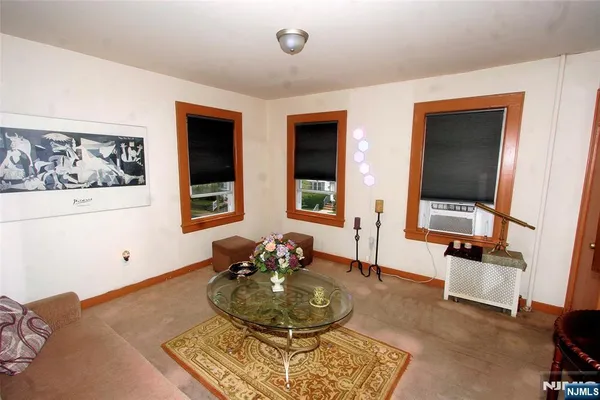 a room with furniture and wooden floor