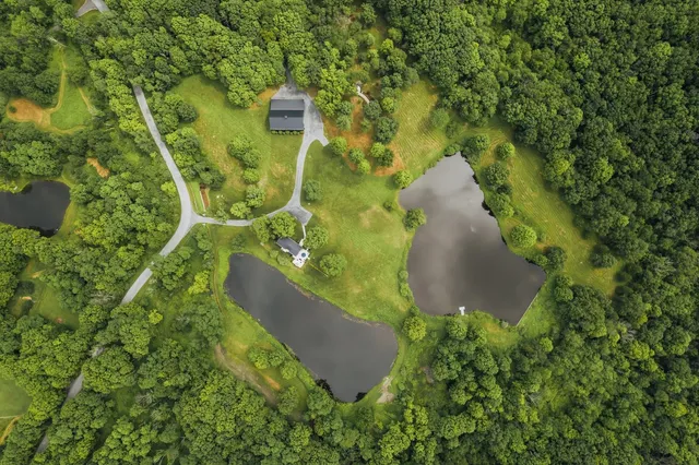 an aerial view of a residential houses