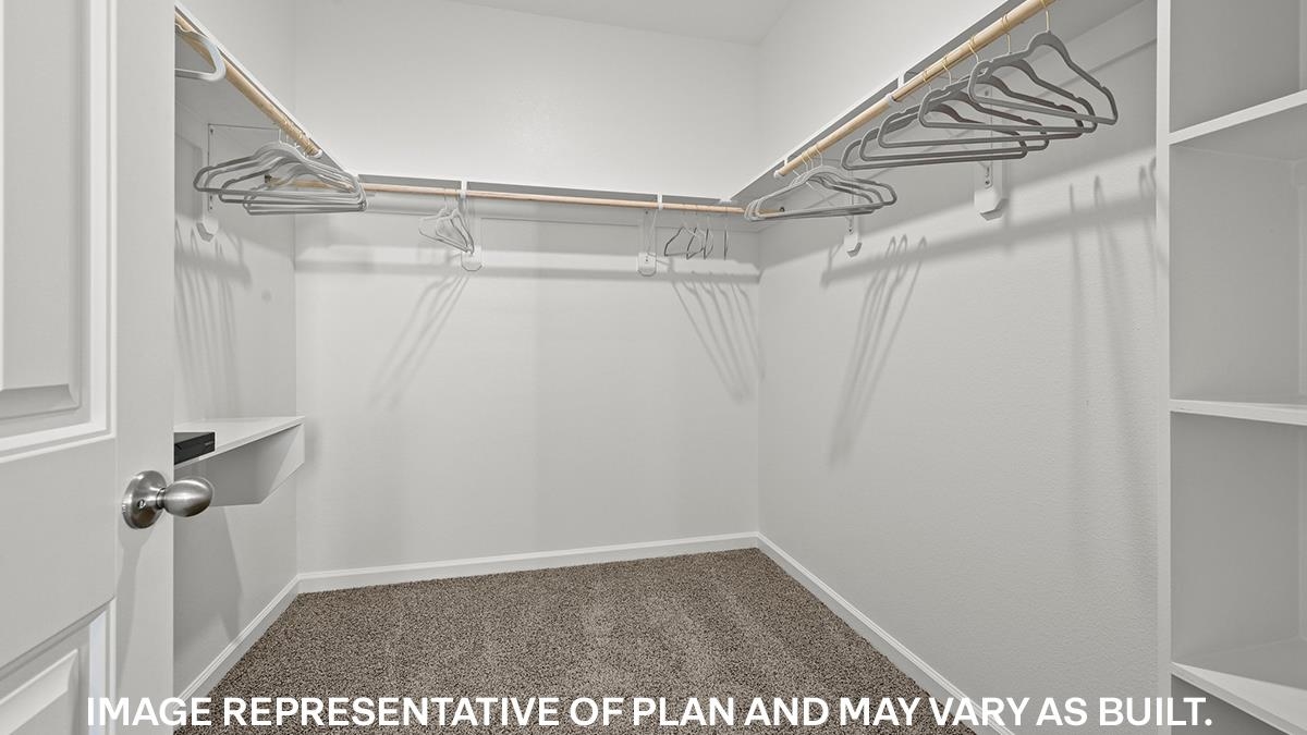 445 Windemere Loop Oakland, TN 38060 - Photo 13 of 23 a view of a room with racks on the wall