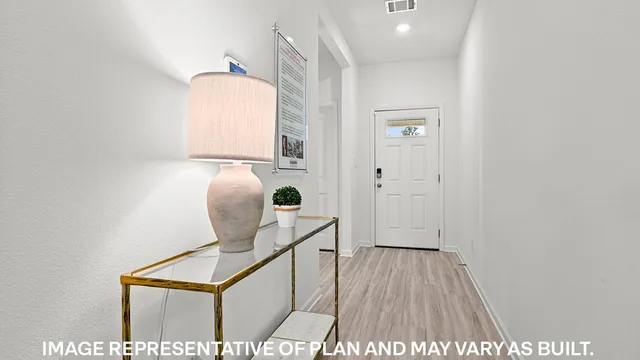 a view of hallway with washer and dryer