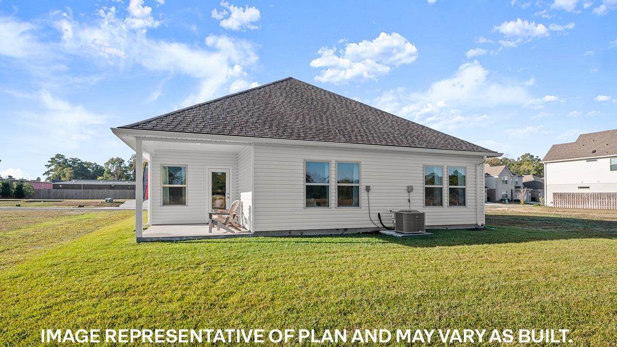 445 Windemere Loop Oakland, TN 38060 - Photo 20 of 23 a front view of house with yard outdoor seating and barbeque oven