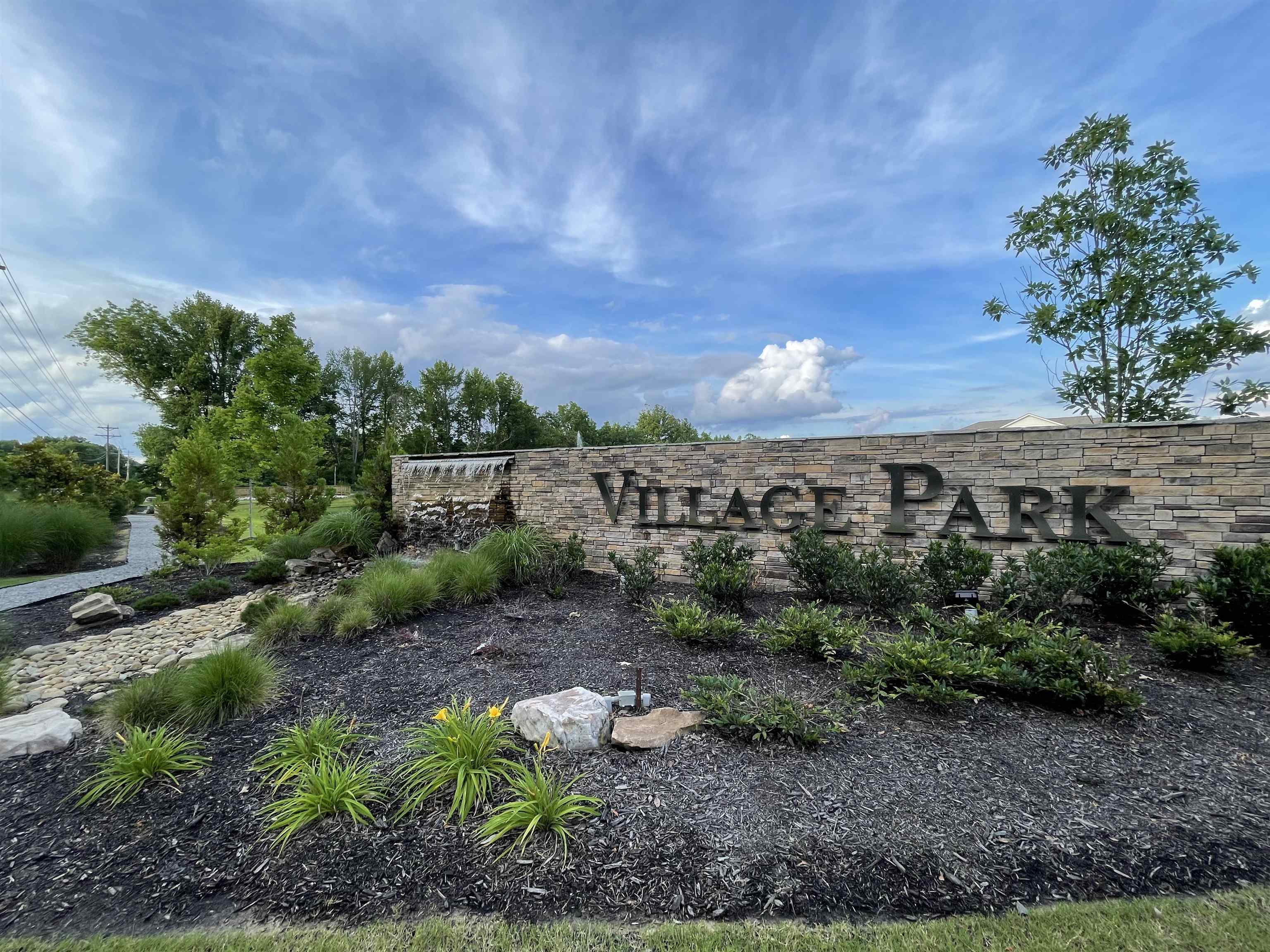 445 Windemere Loop Oakland, TN 38060 - Photo 22 of 23 a view of a pathway with a yard