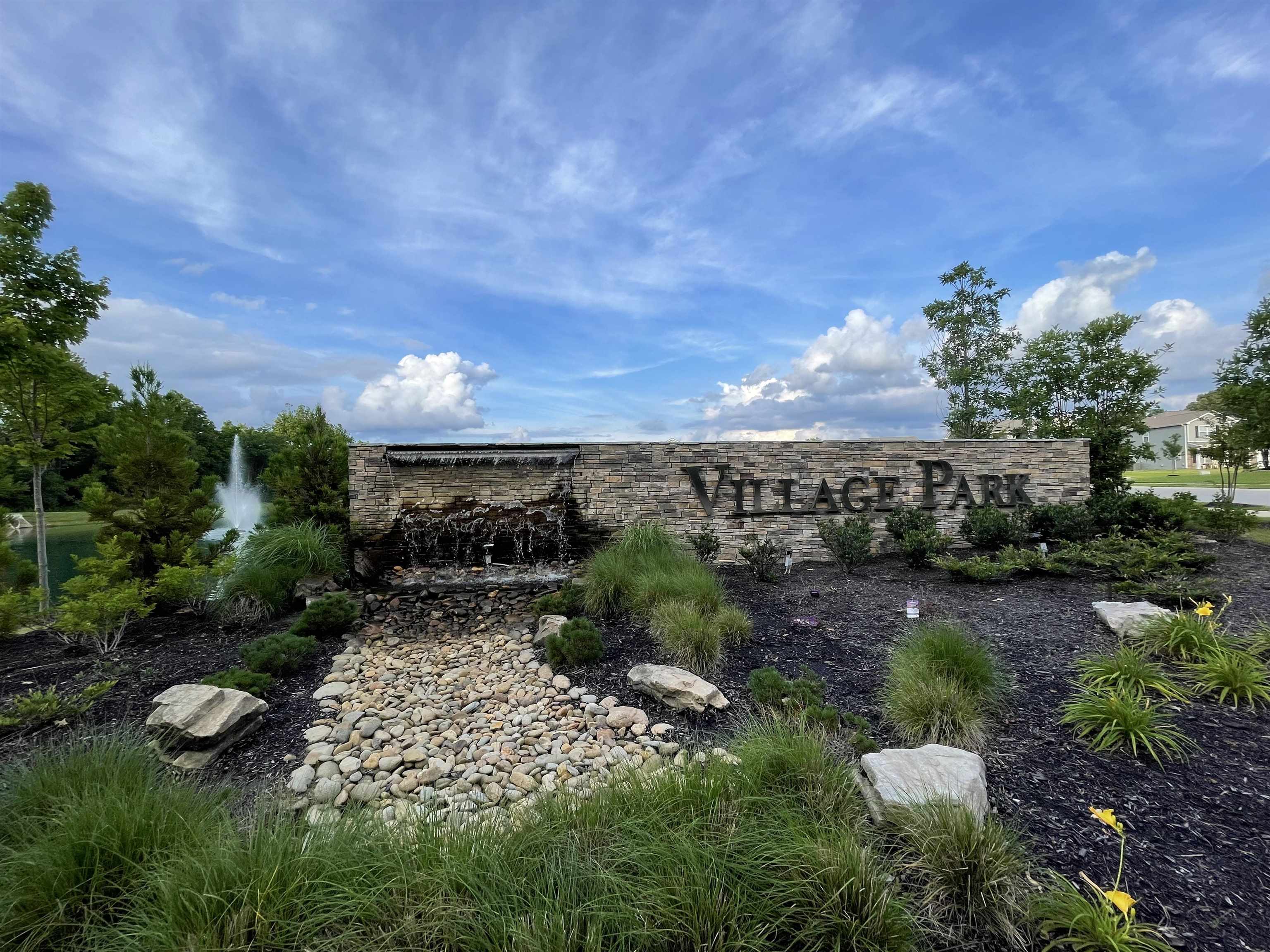 445 Windemere Loop Oakland, TN 38060 - Photo 3 of 23 a view of a garden with lawn chairs