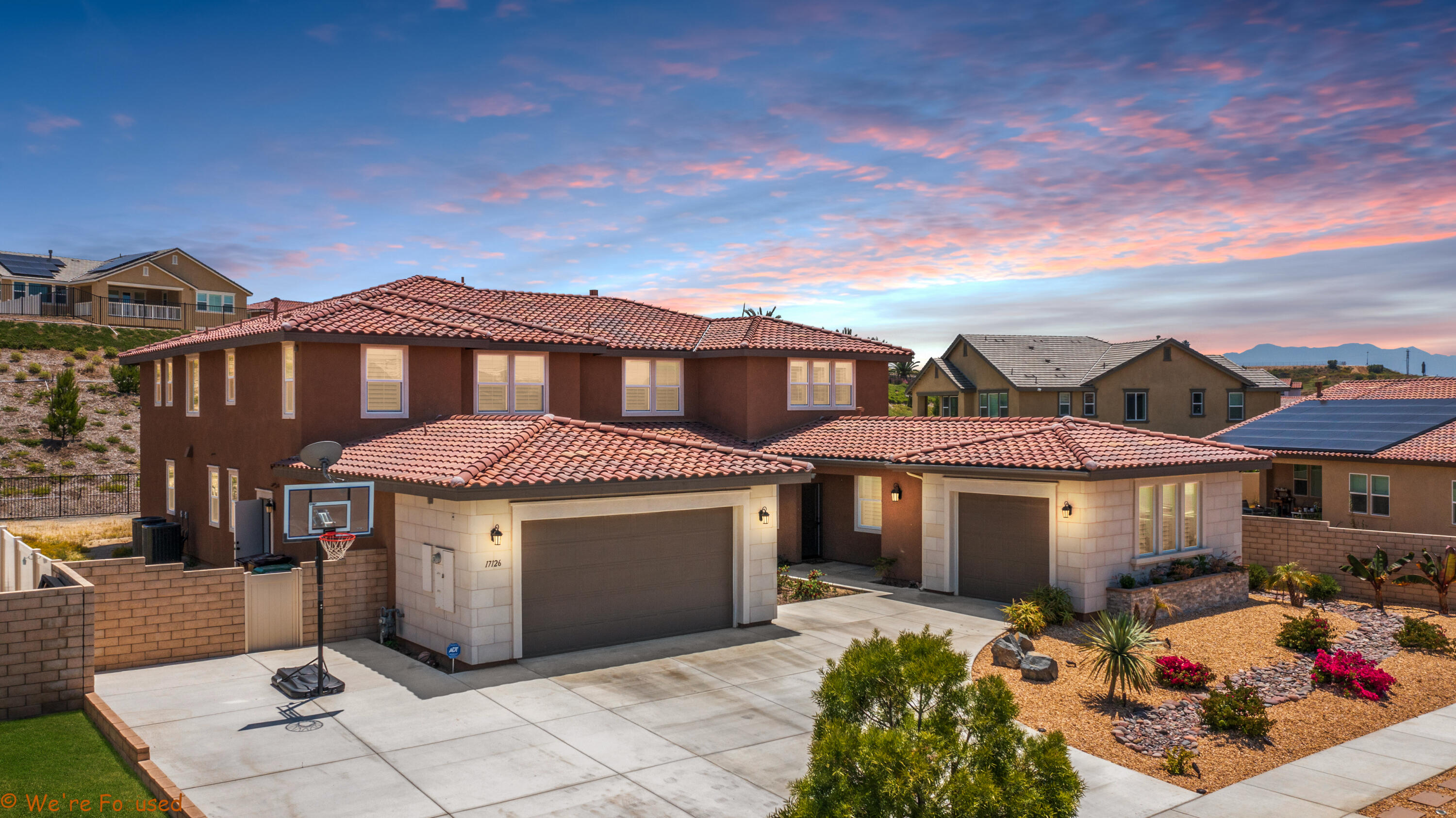 a front view of a house with yard