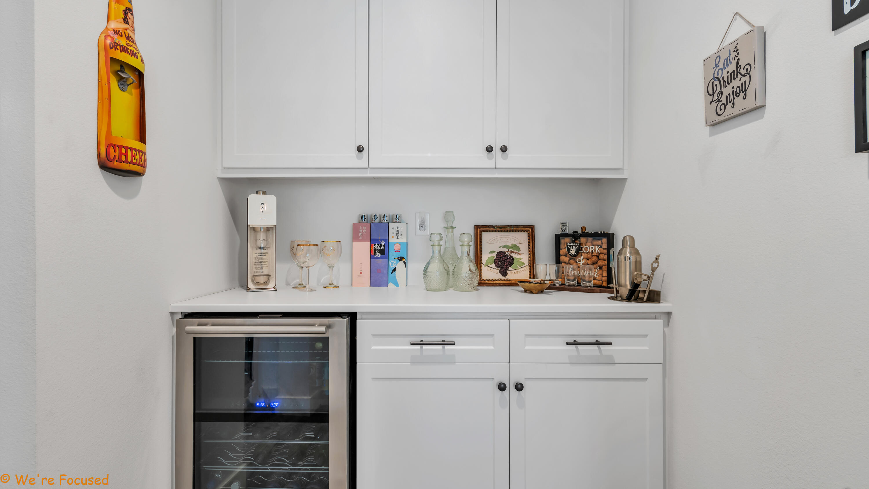 17126 Blue Lake Court Riverside, CA 92503 - Photo 13 of 75 a closeup of a cabinet with white cabinets and wooden floor