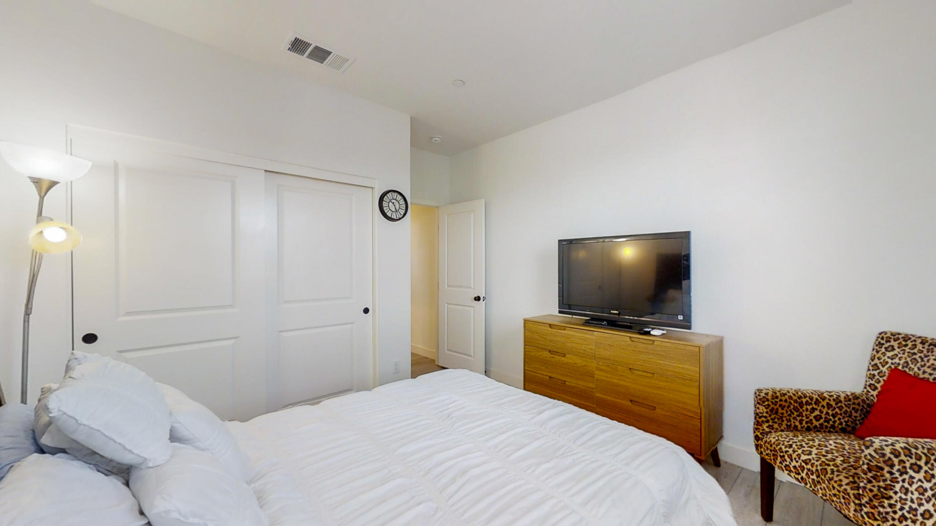 17126 Blue Lake Court Riverside, CA 92503 - Photo 22 of 75 a bedroom with a bed and a flat screen tv