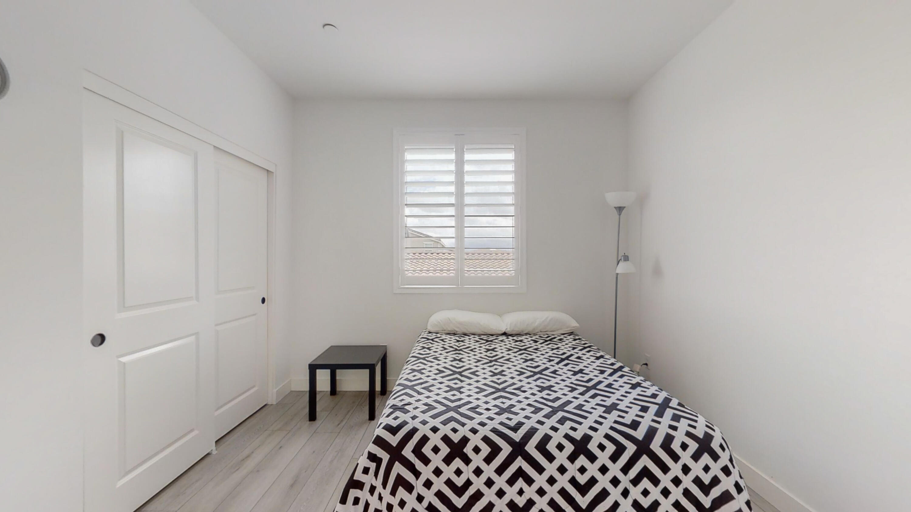 17126 Blue Lake Court Riverside, CA 92503 - Photo 26 of 75 a bedroom with a bed and a window