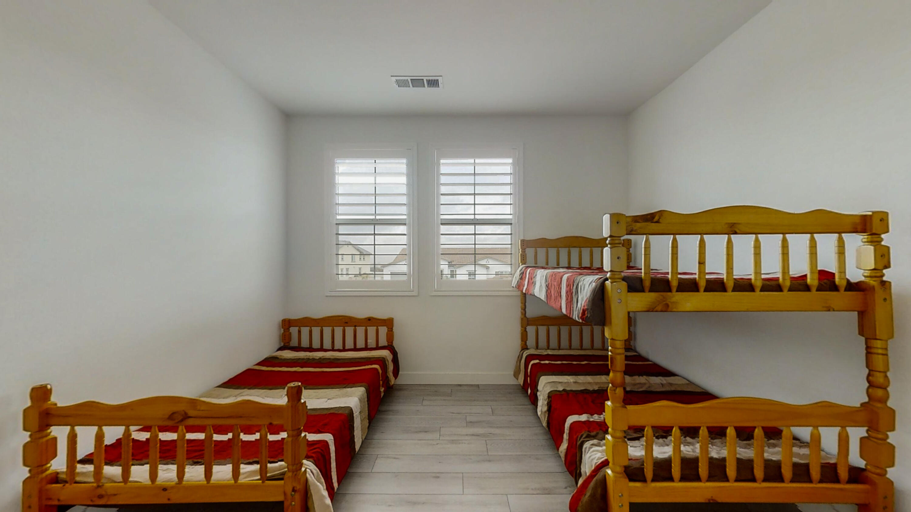 17126 Blue Lake Court Riverside, CA 92503 - Photo 29 of 75 a bedroom with two beds and a window
