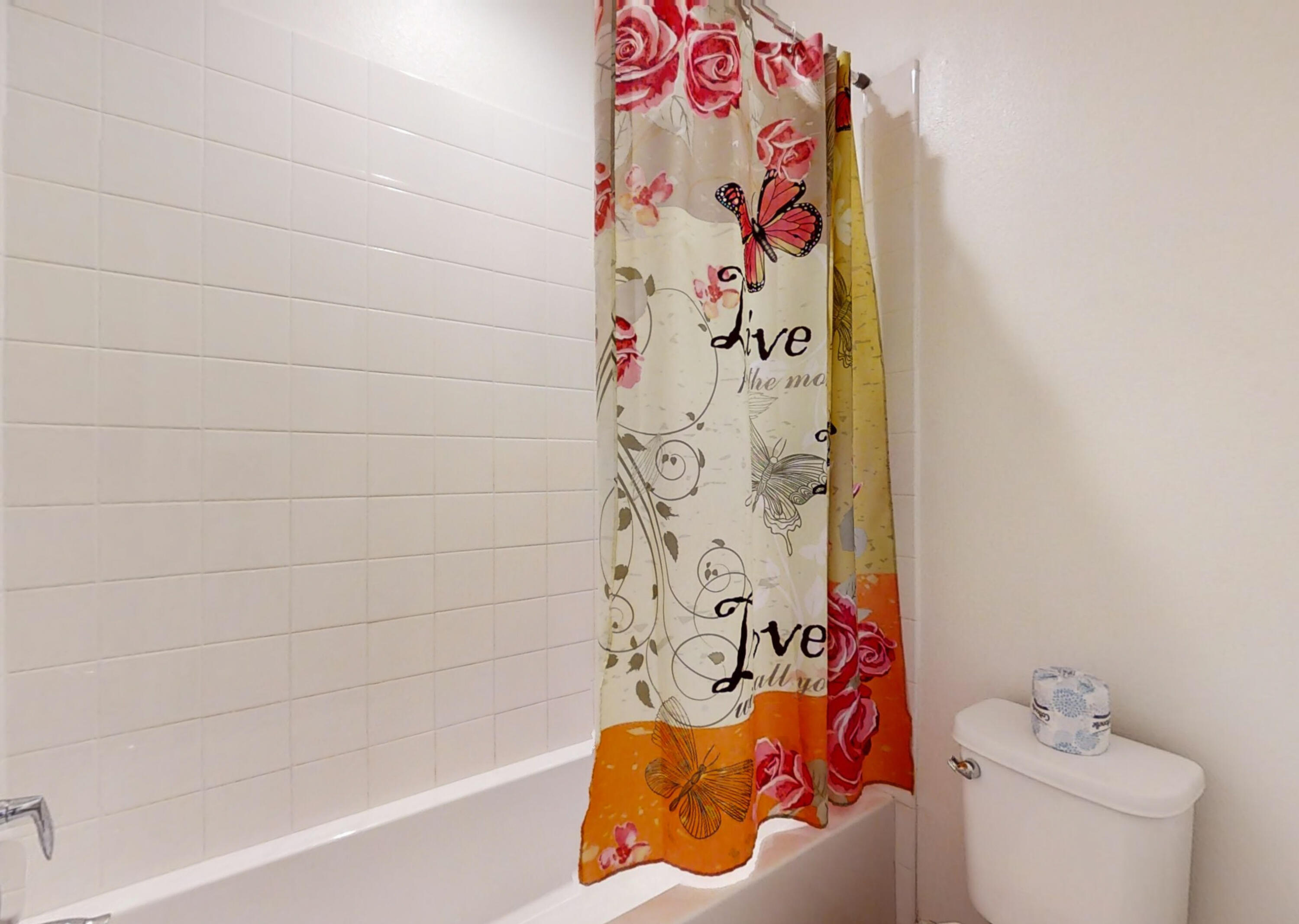 17126 Blue Lake Court Riverside, CA 92503 - Photo 30 of 75 a bathroom with a bathtub and toilet