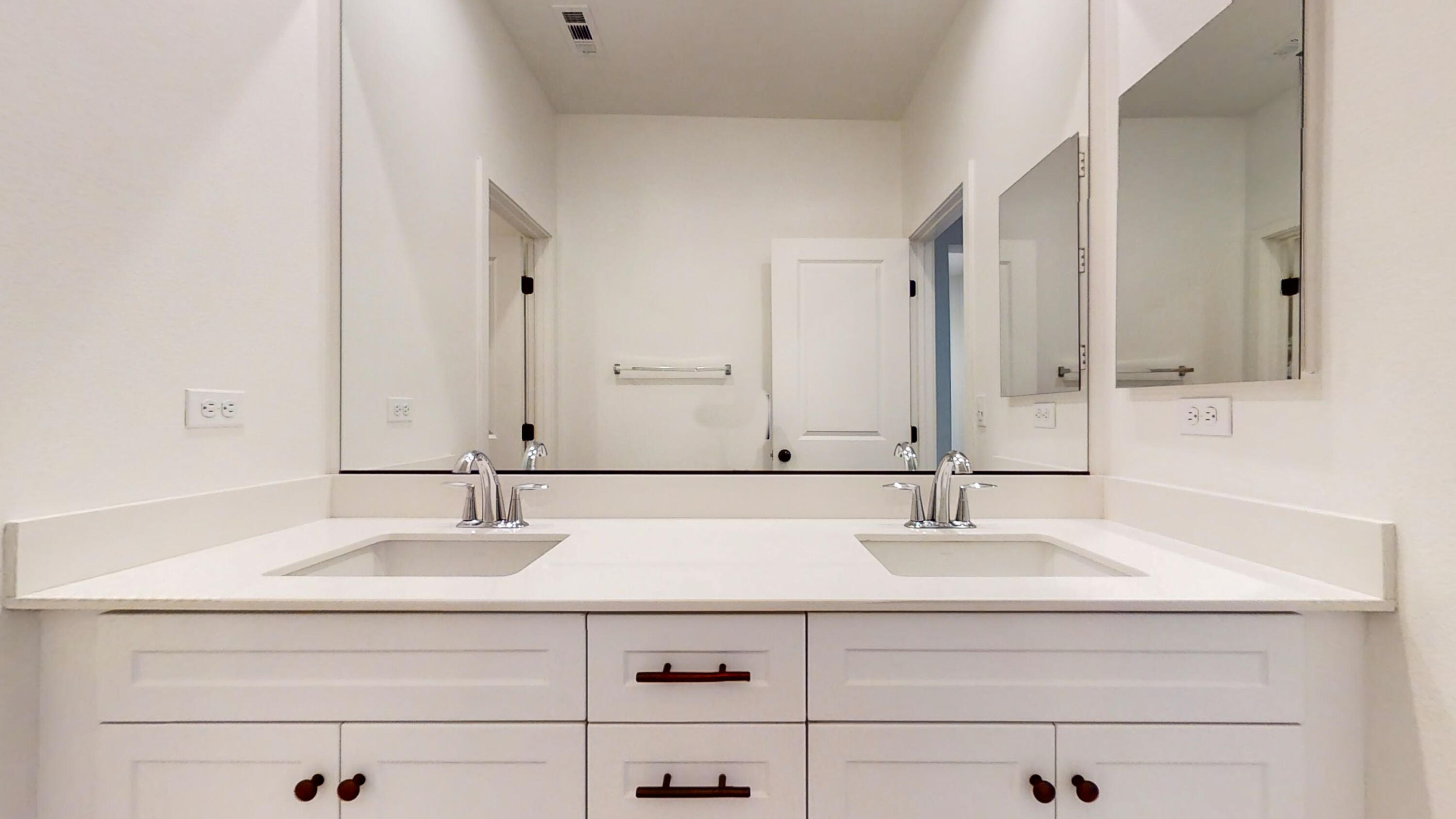 17126 Blue Lake Court Riverside, CA 92503 - Photo 31 of 75 a bathroom with a sink and a mirror