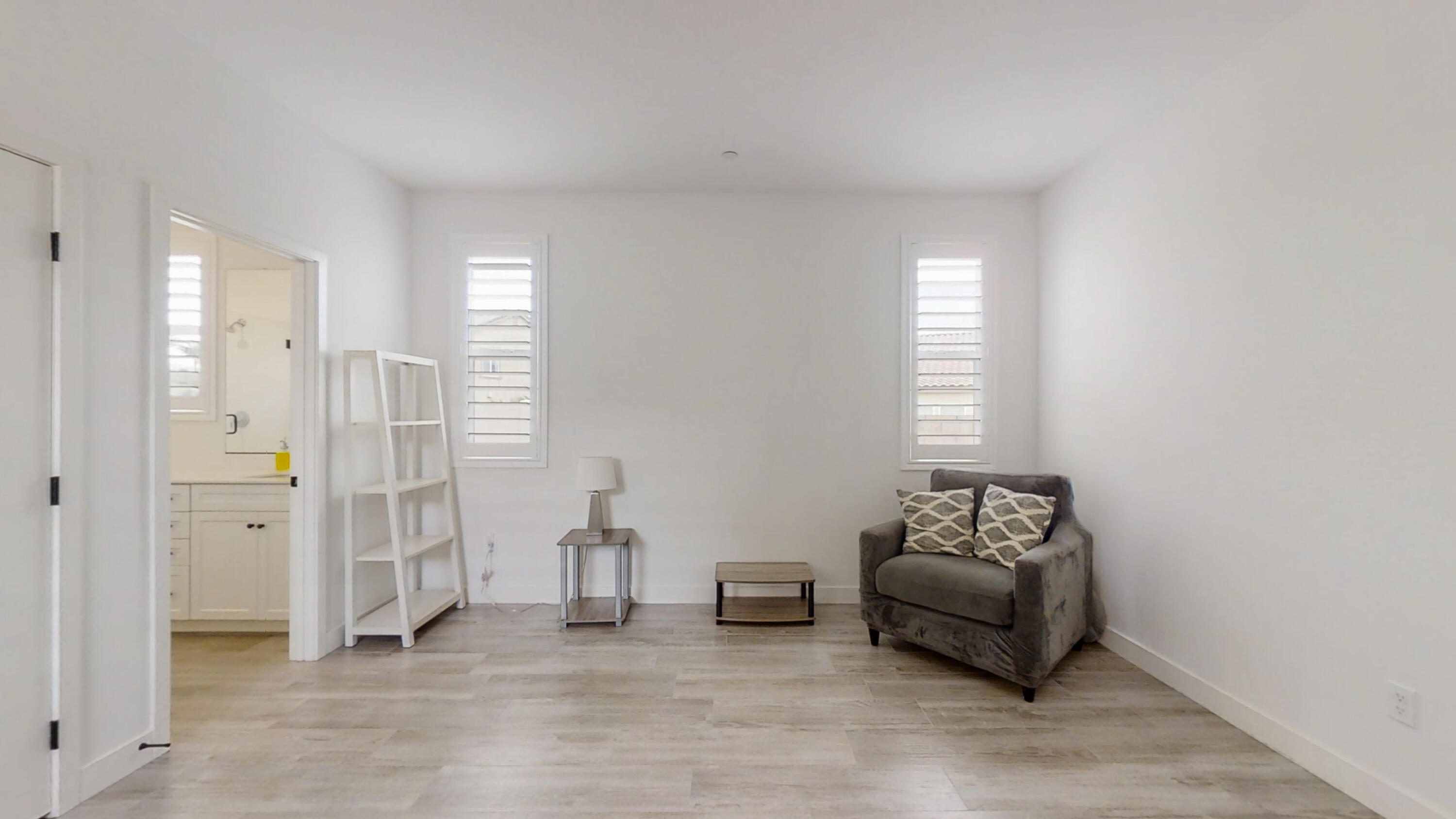17126 Blue Lake Court Riverside, CA 92503 - Photo 39 of 75 a living room with furniture and a window