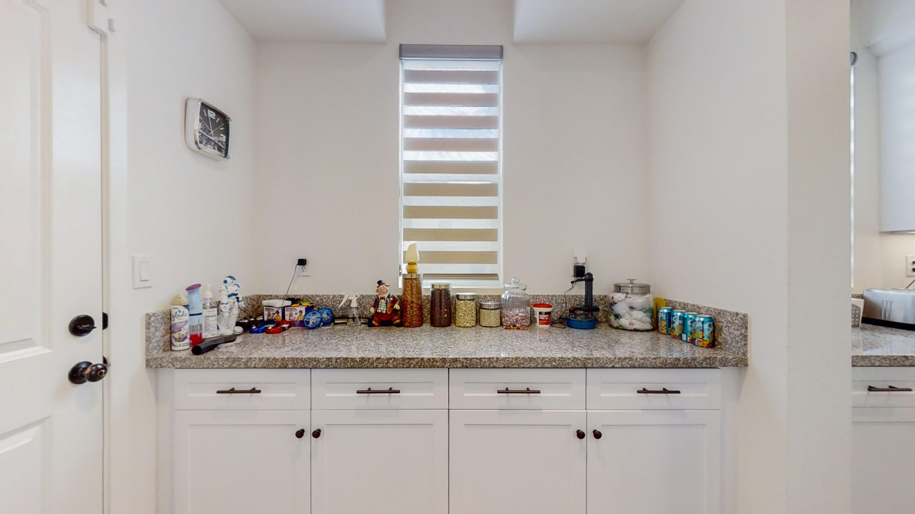 17126 Blue Lake Court Riverside, CA 92503 - Photo 43 of 75 a bathroom with a granite countertop sink and a mirror