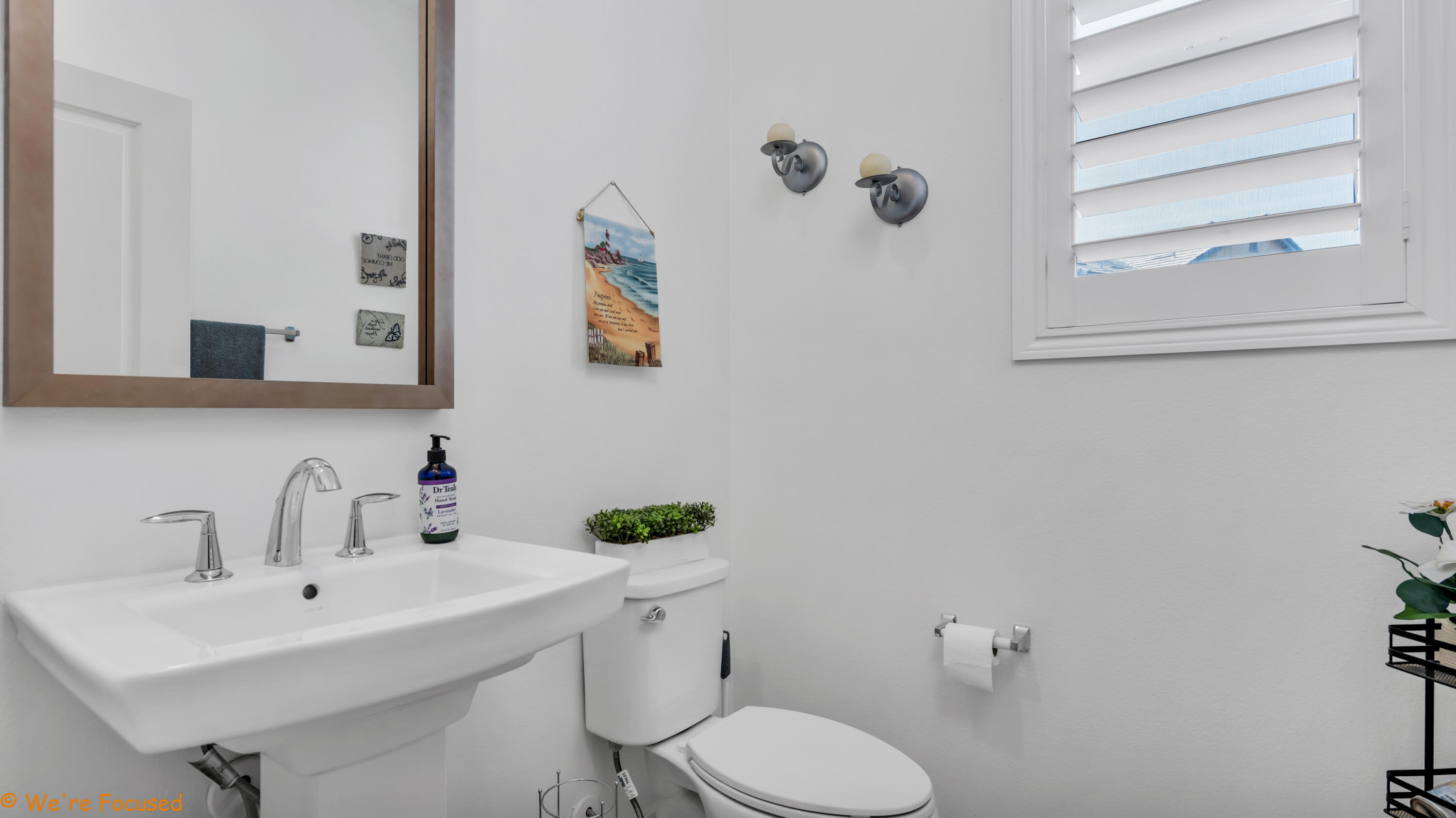 17126 Blue Lake Court Riverside, CA 92503 - Photo 47 of 75 a bathroom with a sink mirror and toilet