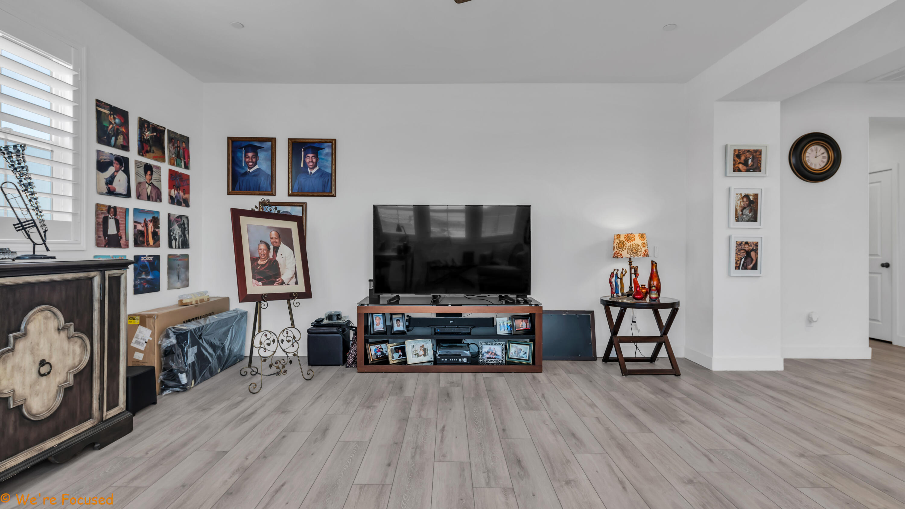 17126 Blue Lake Court Riverside, CA 92503 - Photo 51 of 75 a living room with furniture and a flat screen tv