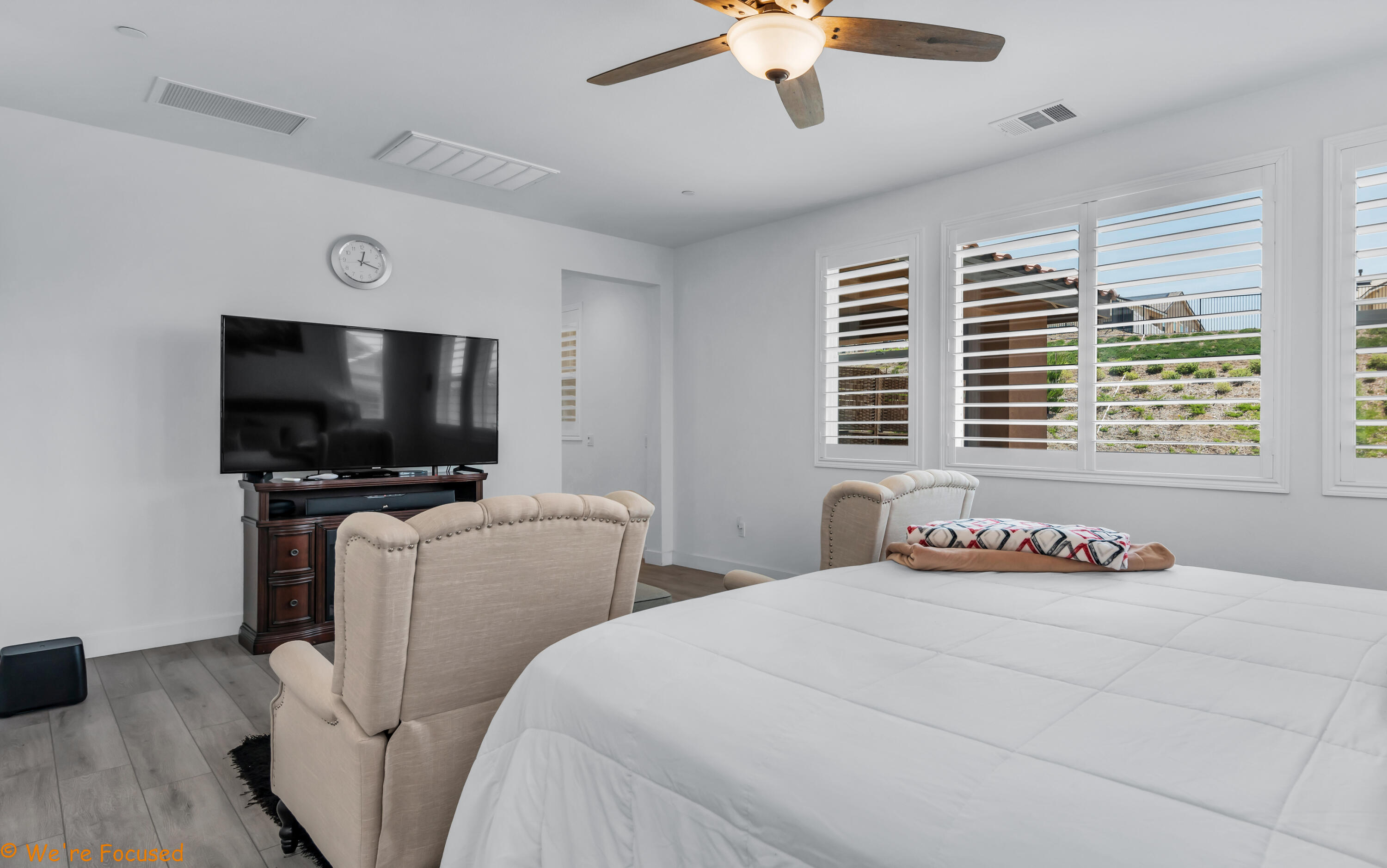 17126 Blue Lake Court Riverside, CA 92503 - Photo 53 of 75 a bedroom with furniture and a flat screen tv