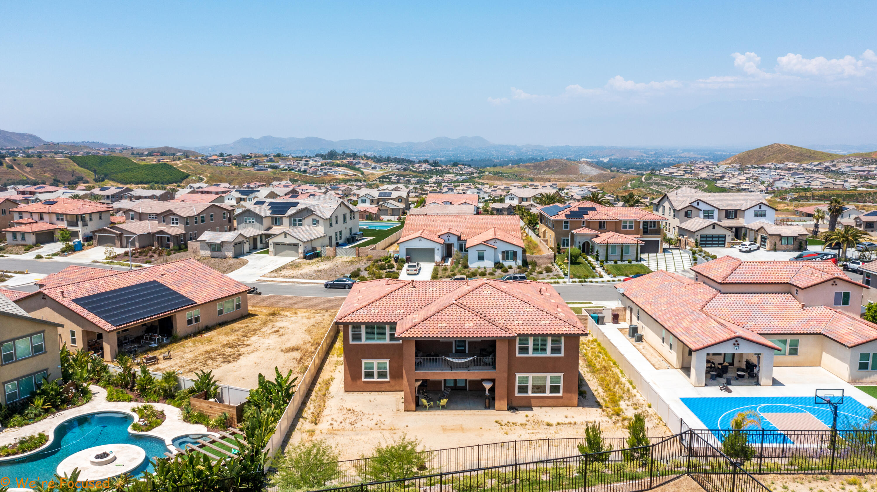 17126 Blue Lake Court Riverside, CA 92503 - Photo 71 of 75 an aerial view of residential houses with outdoor space