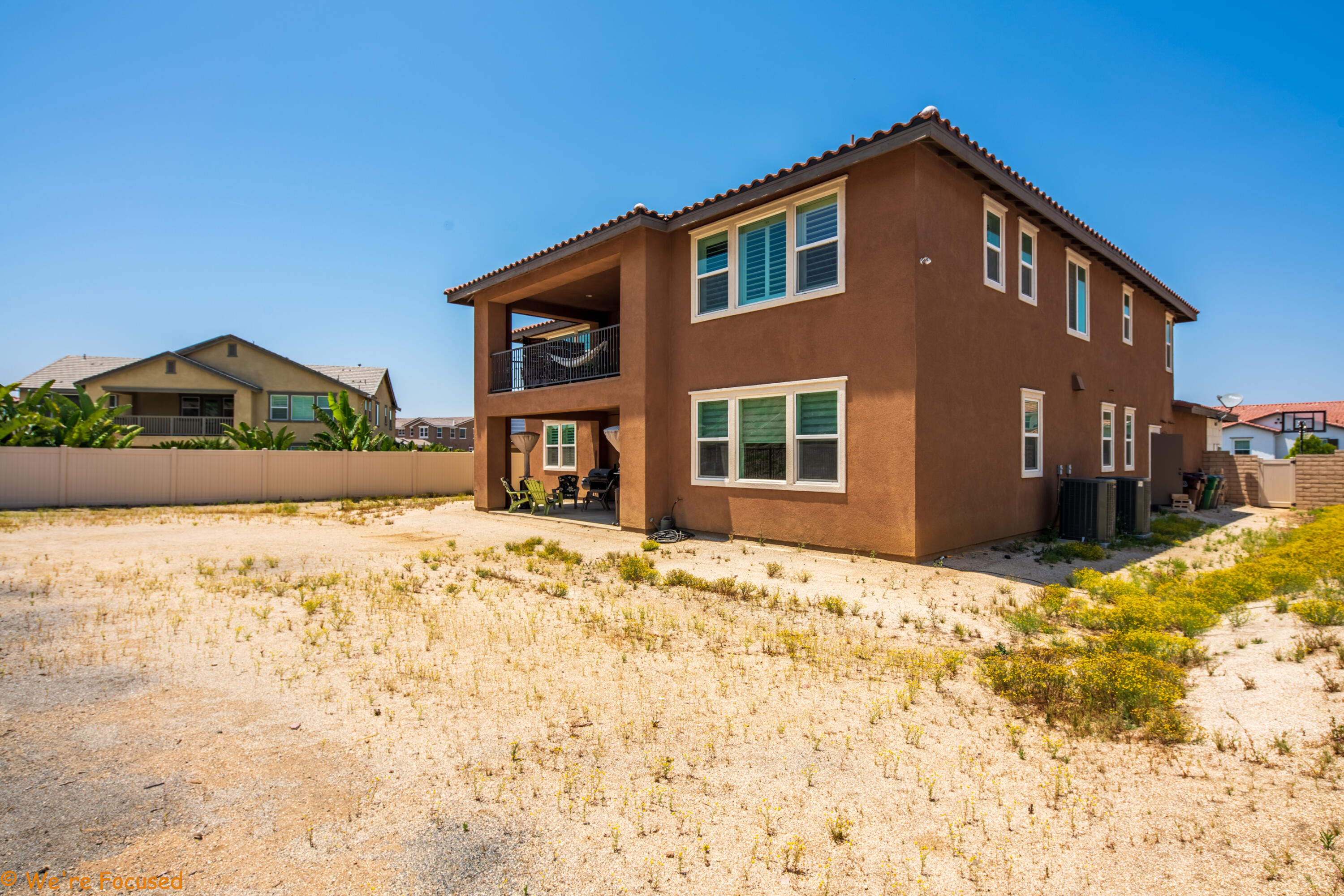 17126 Blue Lake Court Riverside, CA 92503 - Photo 74 of 75 a front view of a house with a yard
