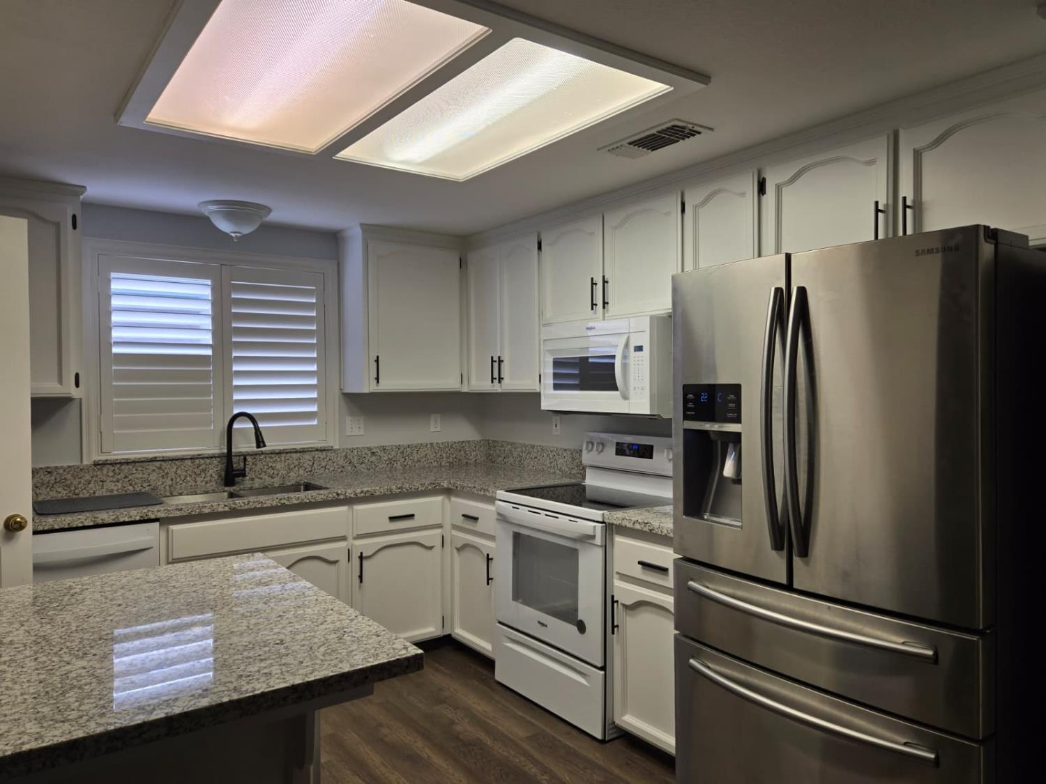 2645 Fowler Avenue Clovis, CA 93611 - Photo 3 of 11 a kitchen with appliances a sink and cabinets