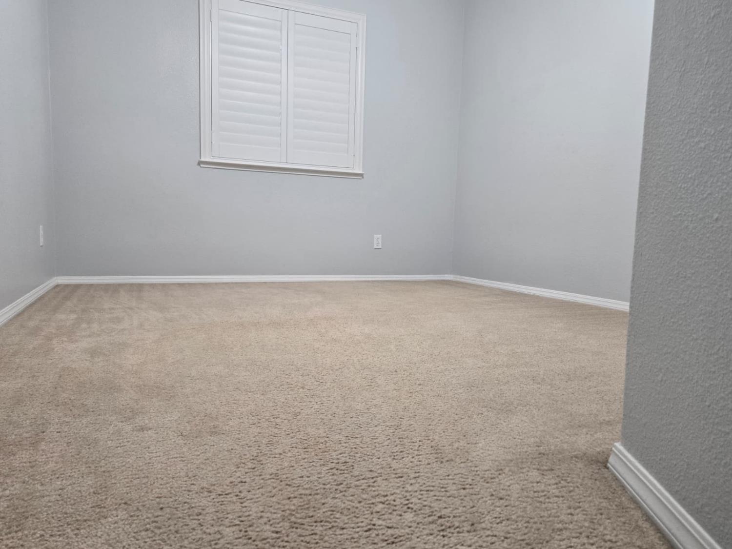 2645 Fowler Avenue Clovis, CA 93611 - Photo 6 of 11 an empty room with a window