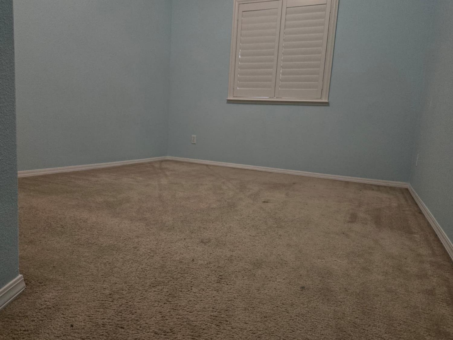 2645 Fowler Avenue Clovis, CA 93611 - Photo 8 of 11 an empty room with a window