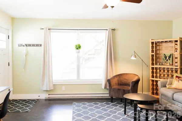 a kitchen with a refrigerator and cabinets
