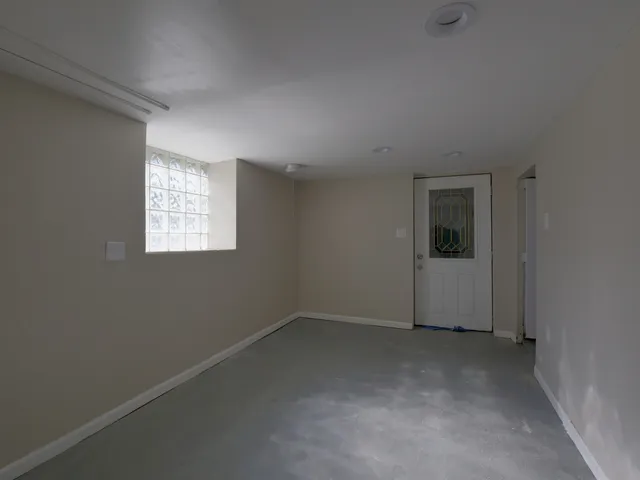 an empty room with windows