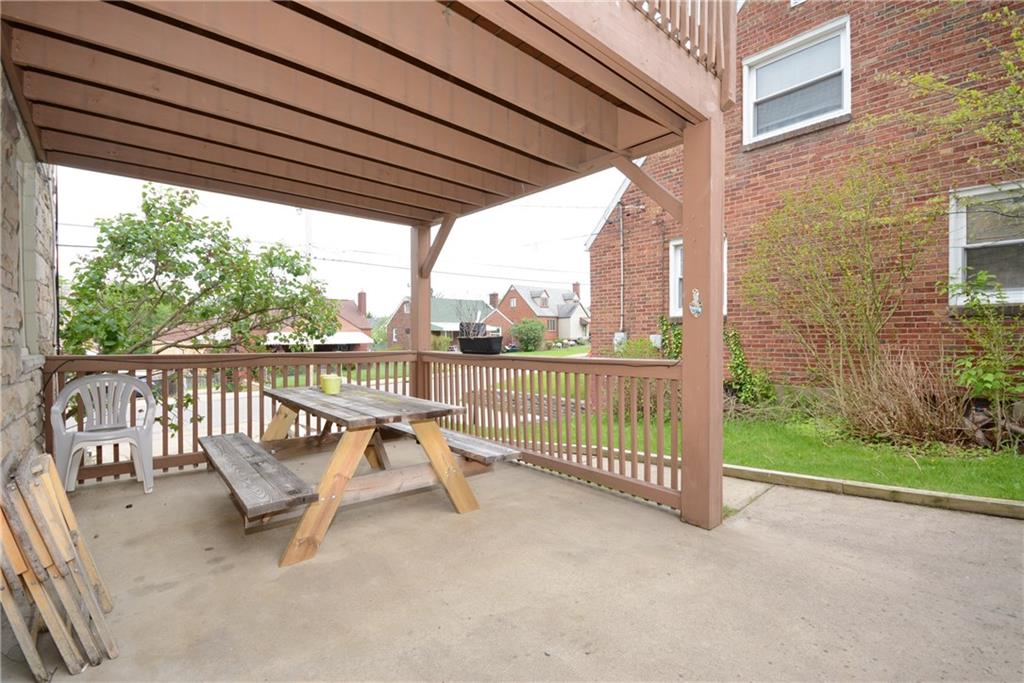 429 Phillips Avenue McKees Rocks, PA 15136 - Photo 22 of 24 The walkway from the front of the house goes all the way to the back yard!