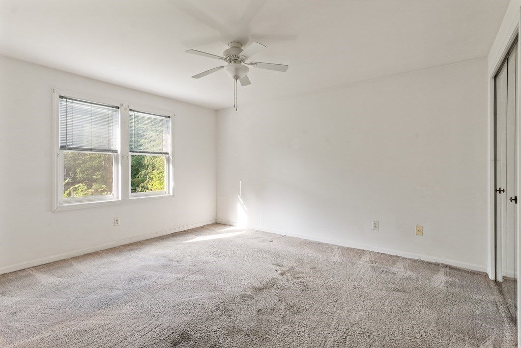 29 Ledgebrook Drive, Unit 29 Blackstone, MA 01504 - Photo 17 of 38 an empty room with a window