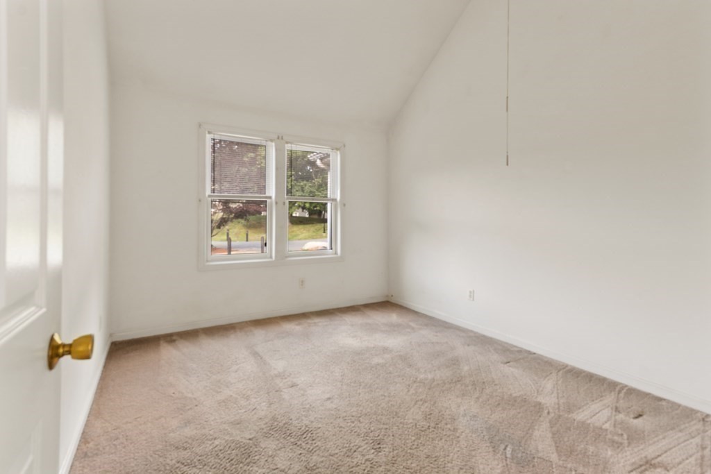 29 Ledgebrook Drive, Unit 29 Blackstone, MA 01504 - Photo 22 of 38 an empty room with windows